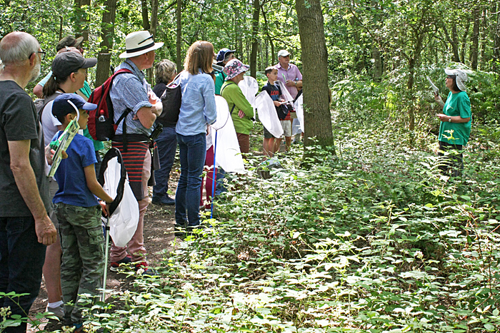 Ros Taylor with group in woodland