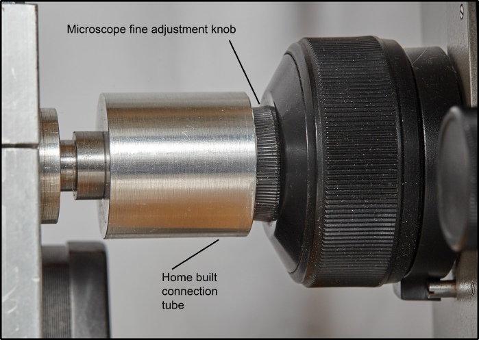 Spindle connection to microscope fine control knob