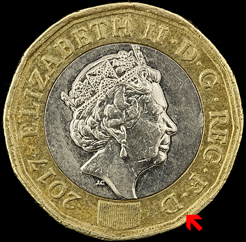 Location of micro writing on £1 coin