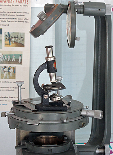 Child’s microscope on stage of Vickers Projection Microscope
