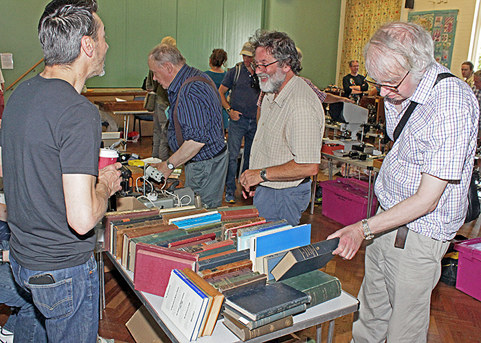 Brian Norman and Stephen Parker browsing Harold Hillman’s books