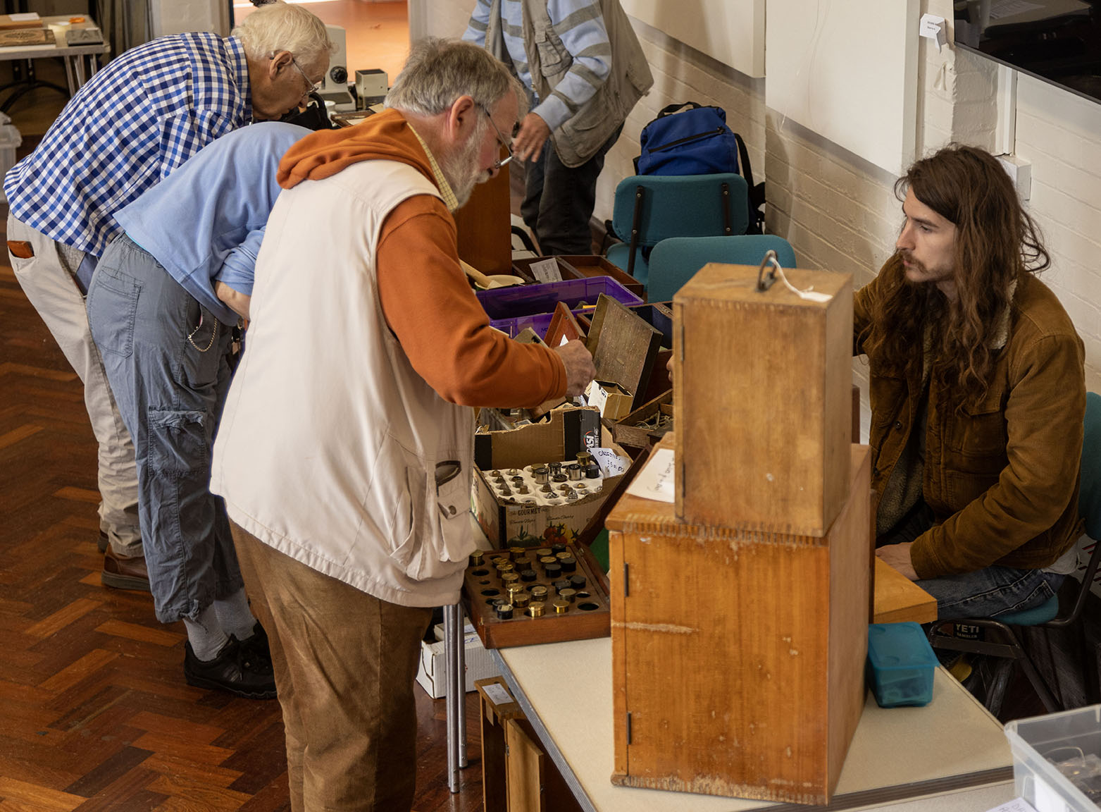 Mark Shephard and Chris Kennedy look at antique items at George & Richard Courtier's table