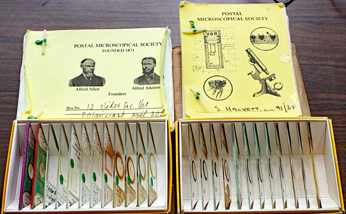PMS slide boxes and notebooks